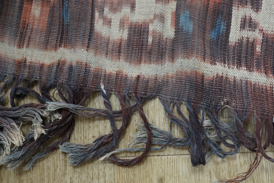 A Sumbanese shoulder cloth, an Indian chain stitch panel and a finely woven silk stole